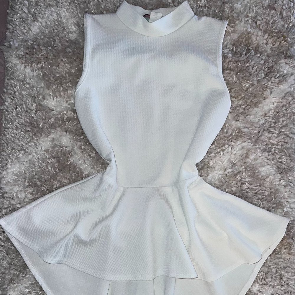 White blouse with a long tail